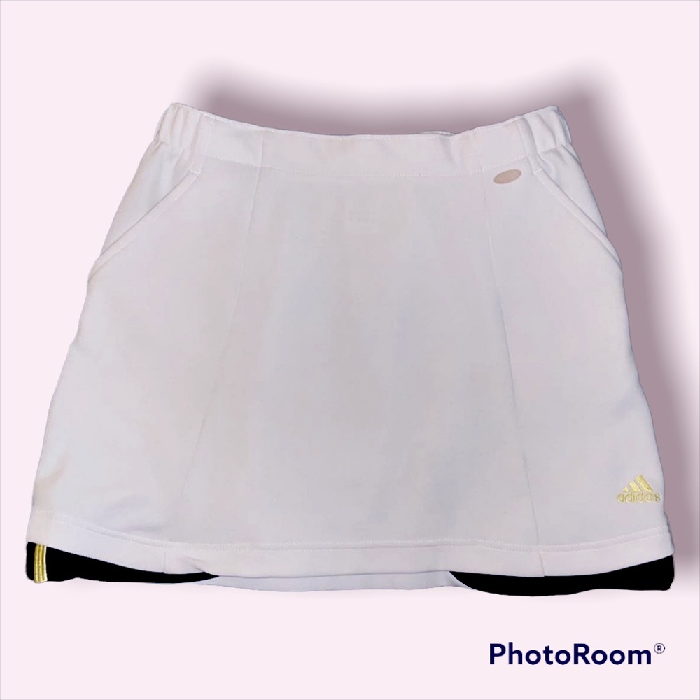 White Adidas tennis skirt.